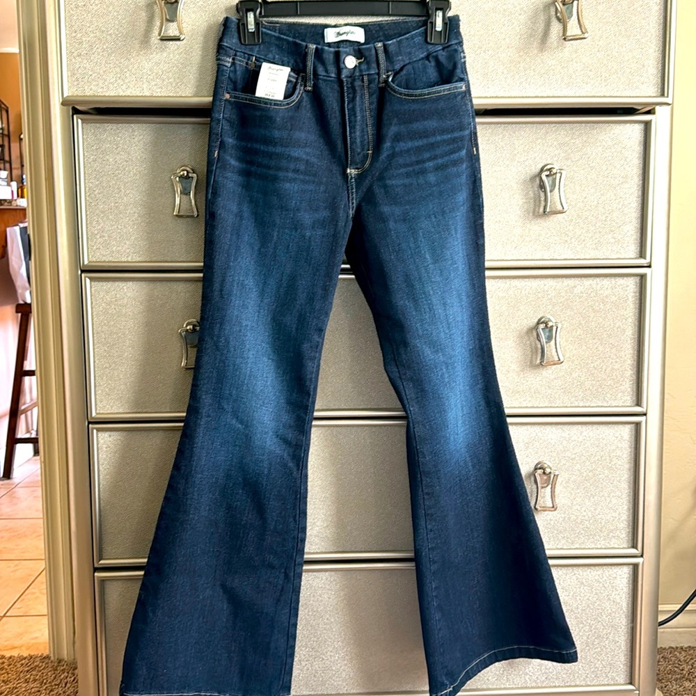 Brand new, washed once but I didn’t wear them. Bespoke Flare Wranglers